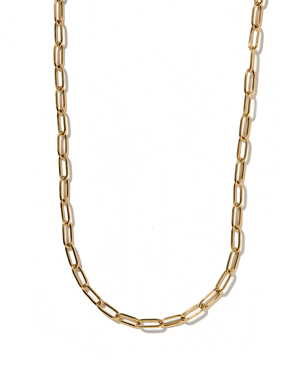 Gold chain necklace on a white background