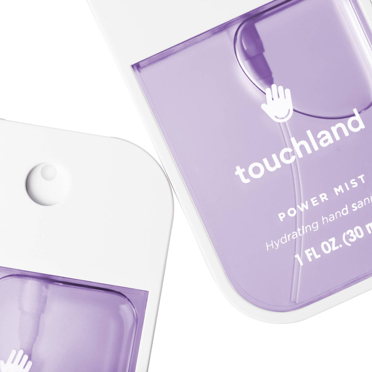 Purple hand sanitizer bottle with 'touchland' branding on a white background