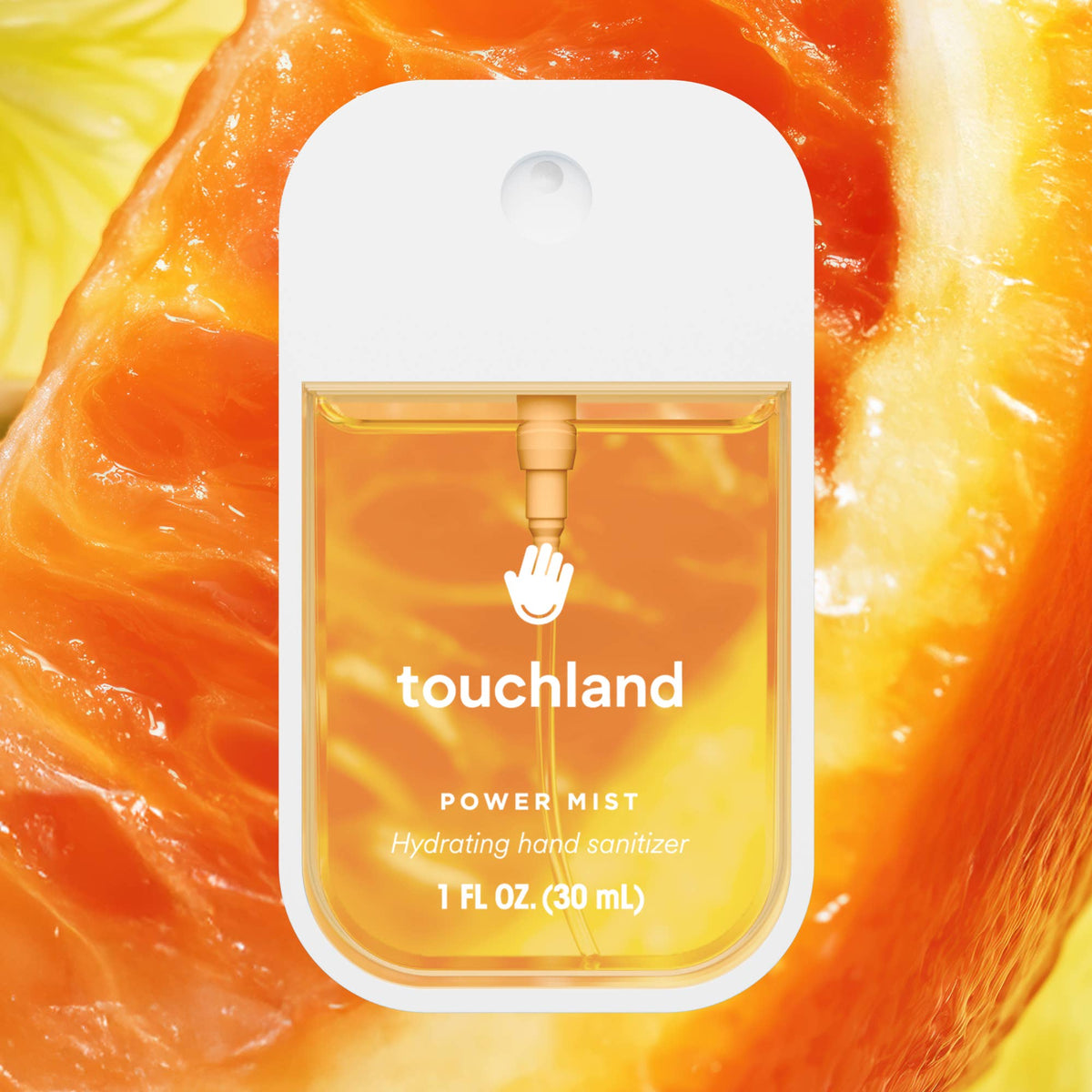 Touchland power mist hand sanitizer packaging on an orange background