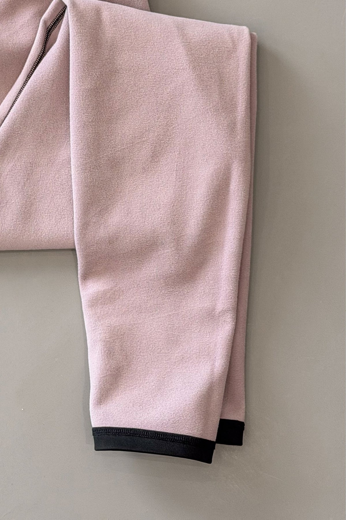 leggings folded inside out showing the fleece interior 