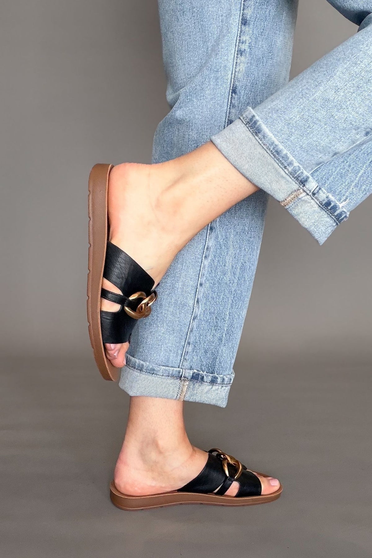 Corkys Chain Letter slide styled with denim
