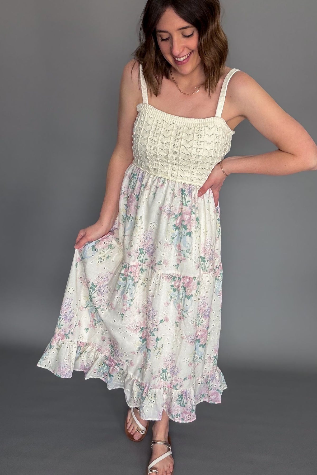 Crochet bodice floral midi dress with adjustable straps and tiered ruffle skirt