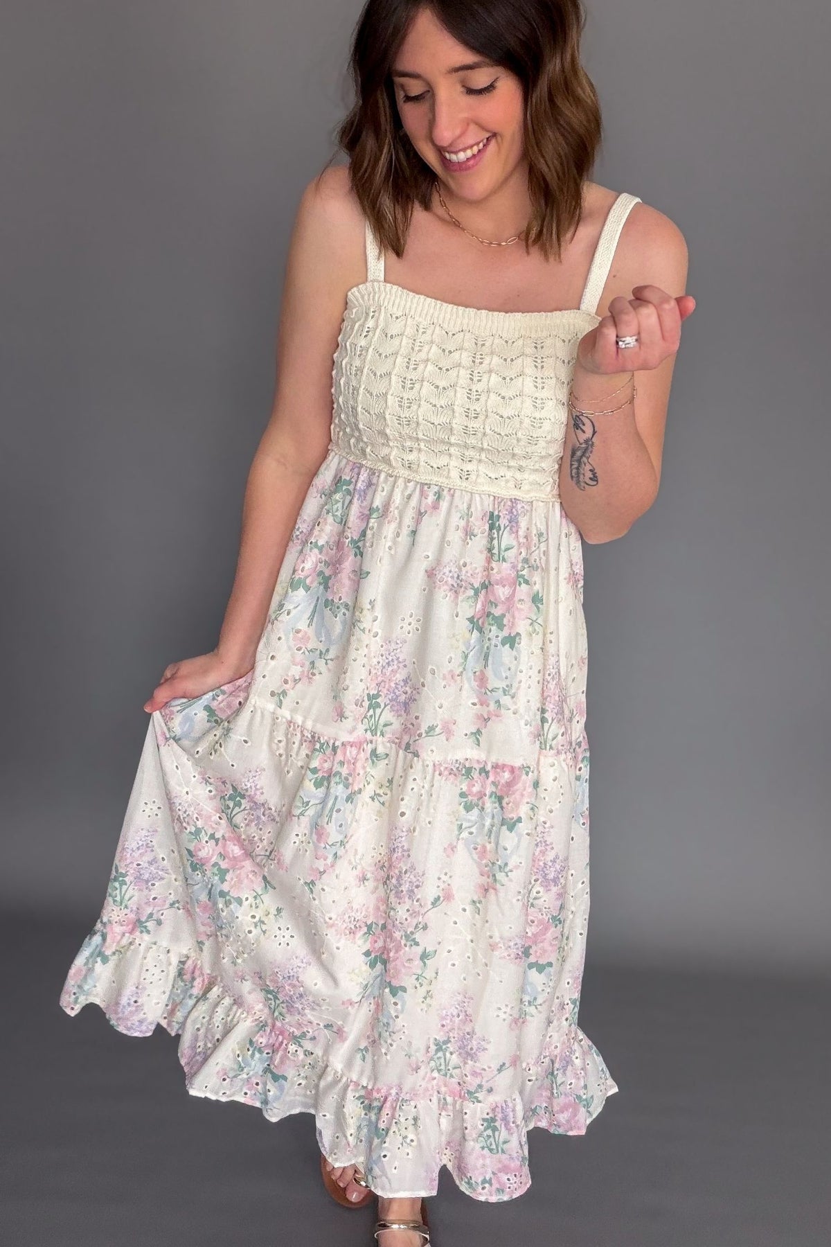Crochet bodice floral midi dress with adjustable straps and tiered ruffle skirt