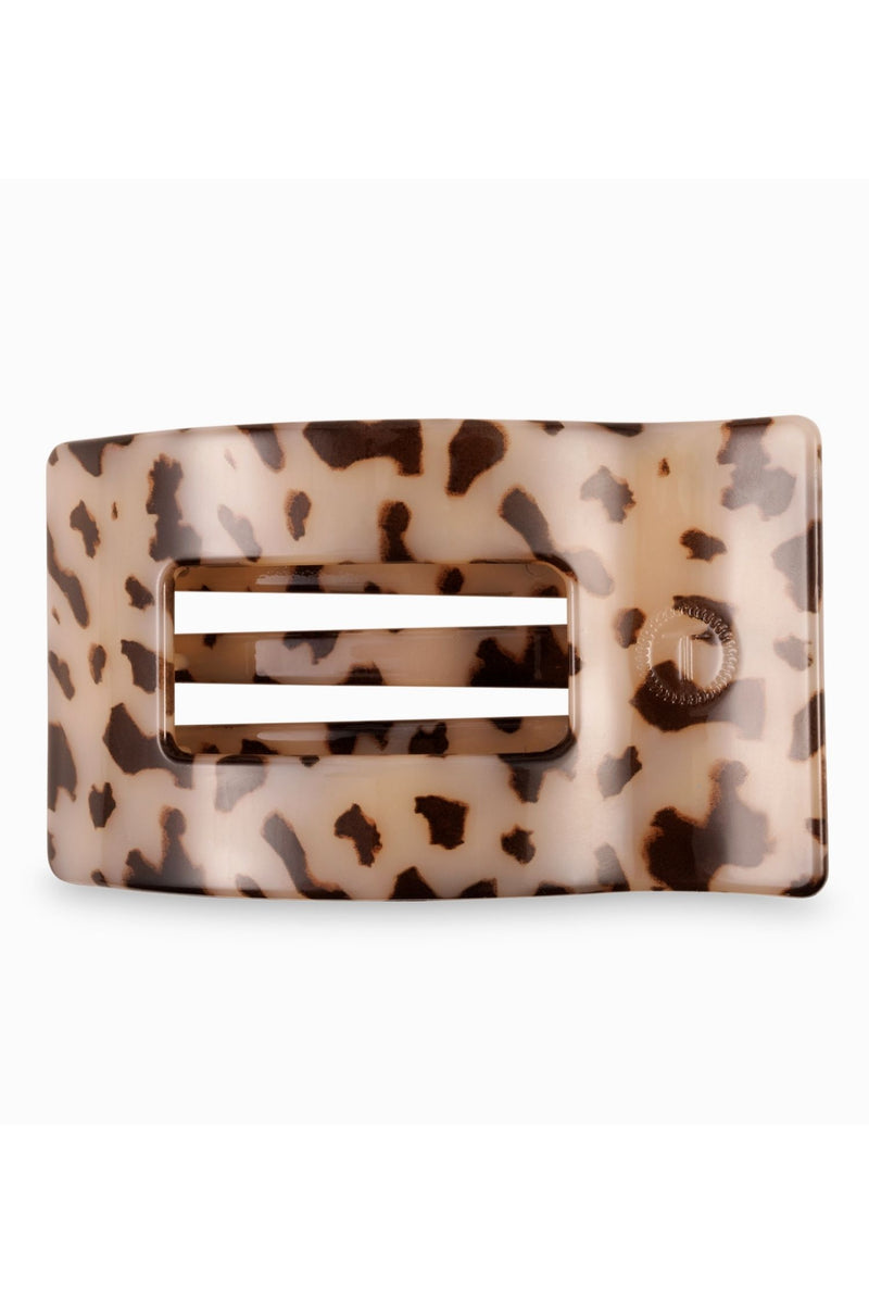 tortoise print hair claw on a white background