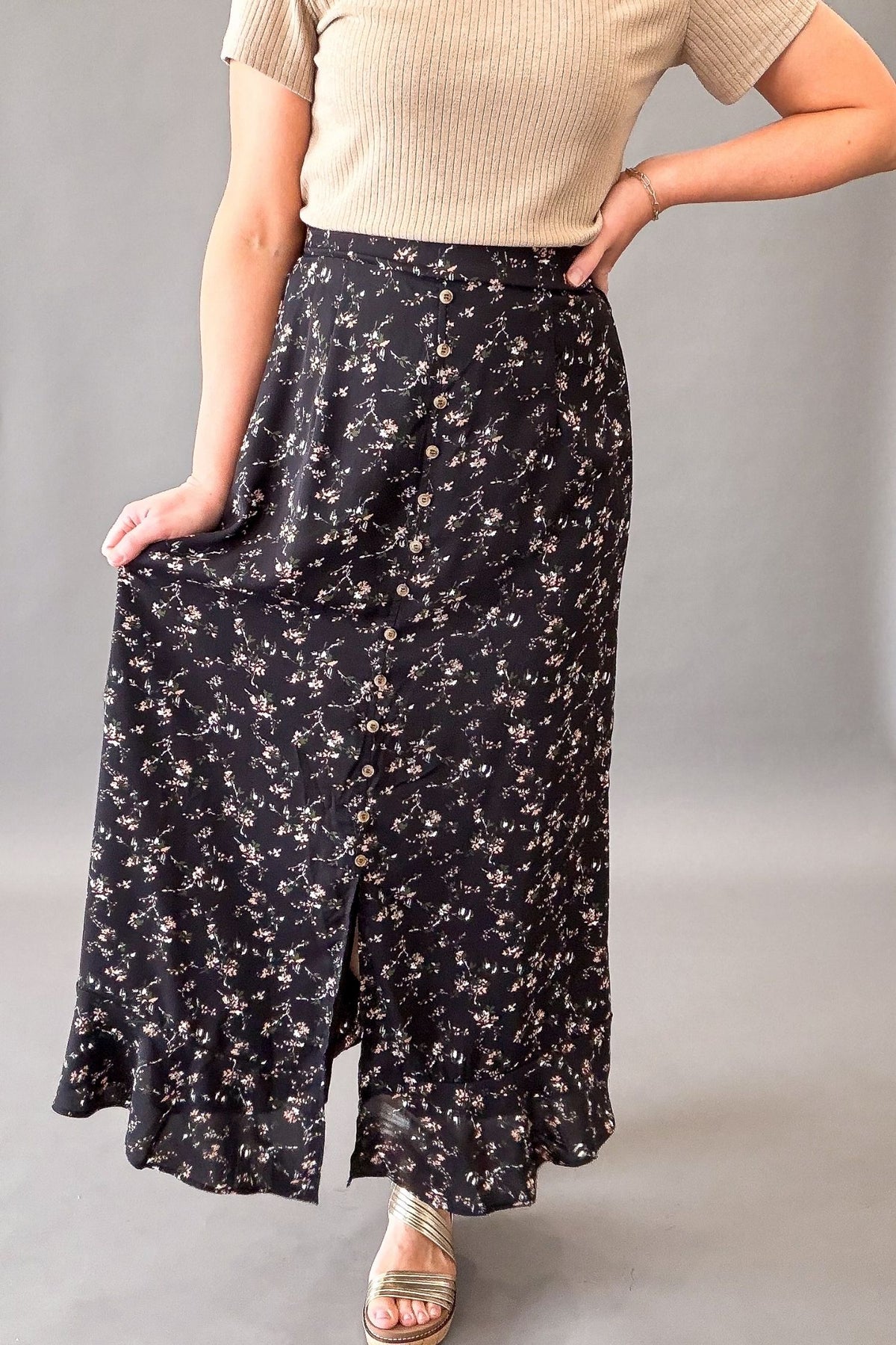 Black floral maxi skirt with front slit and pockets