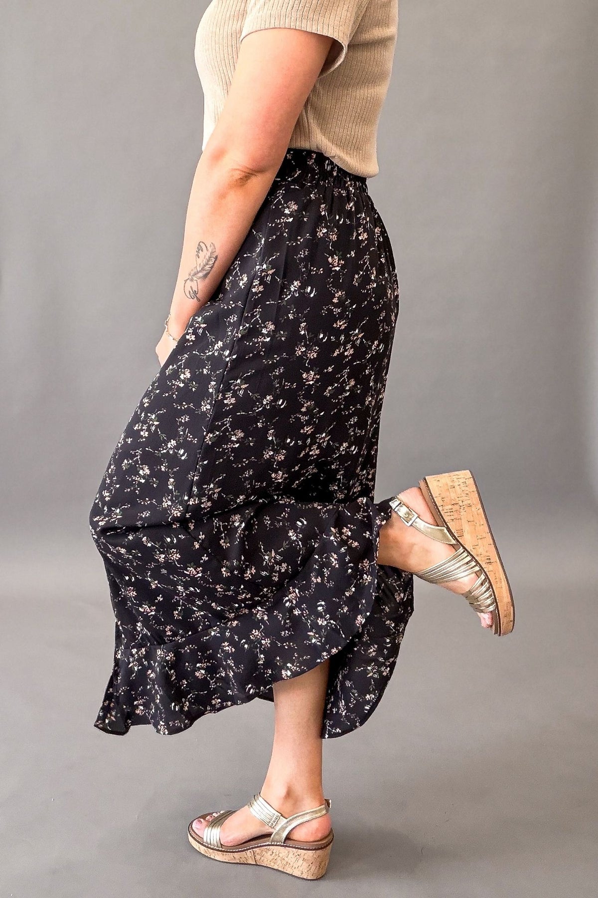 Modest black floral skirt with flowy silhouette