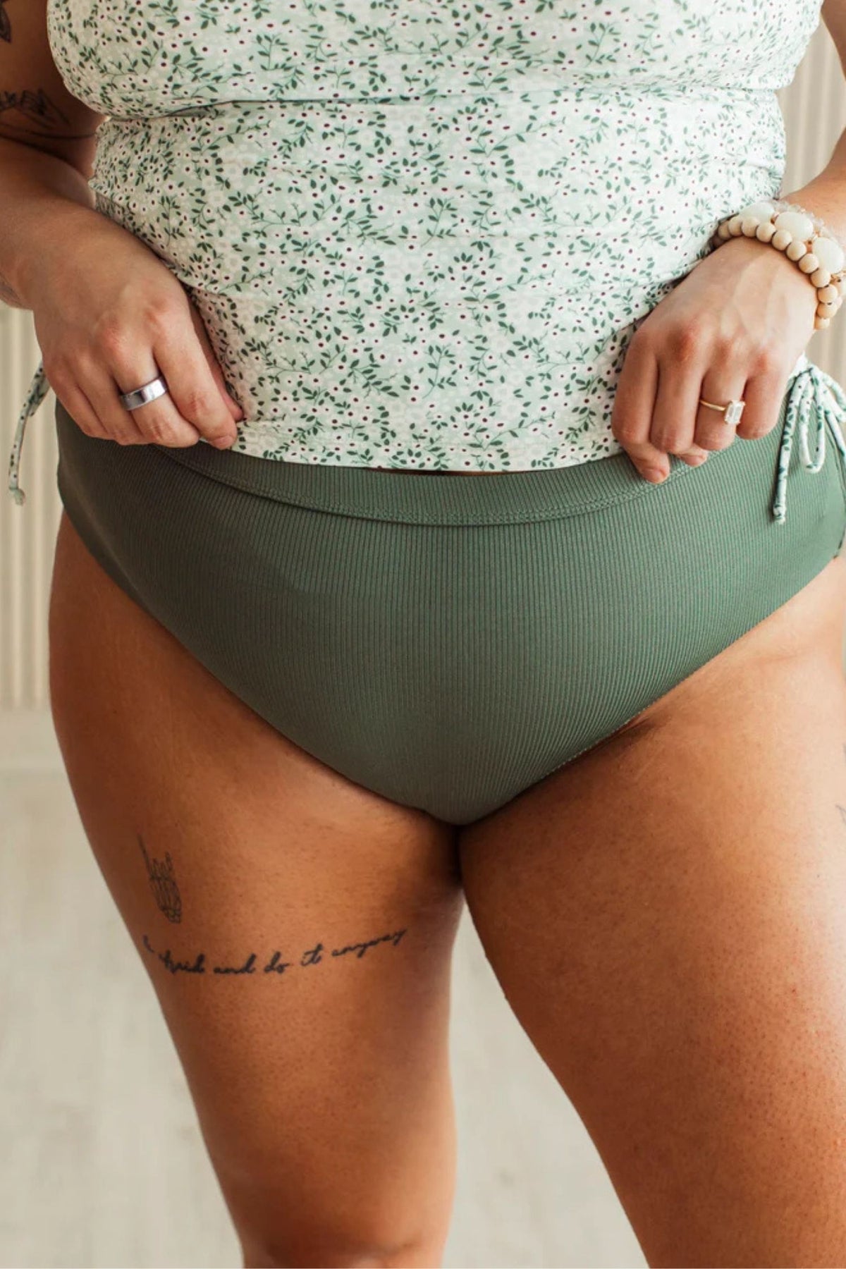 Green ribbed high rise bikini swim bottoms with flattering fit and coverage.