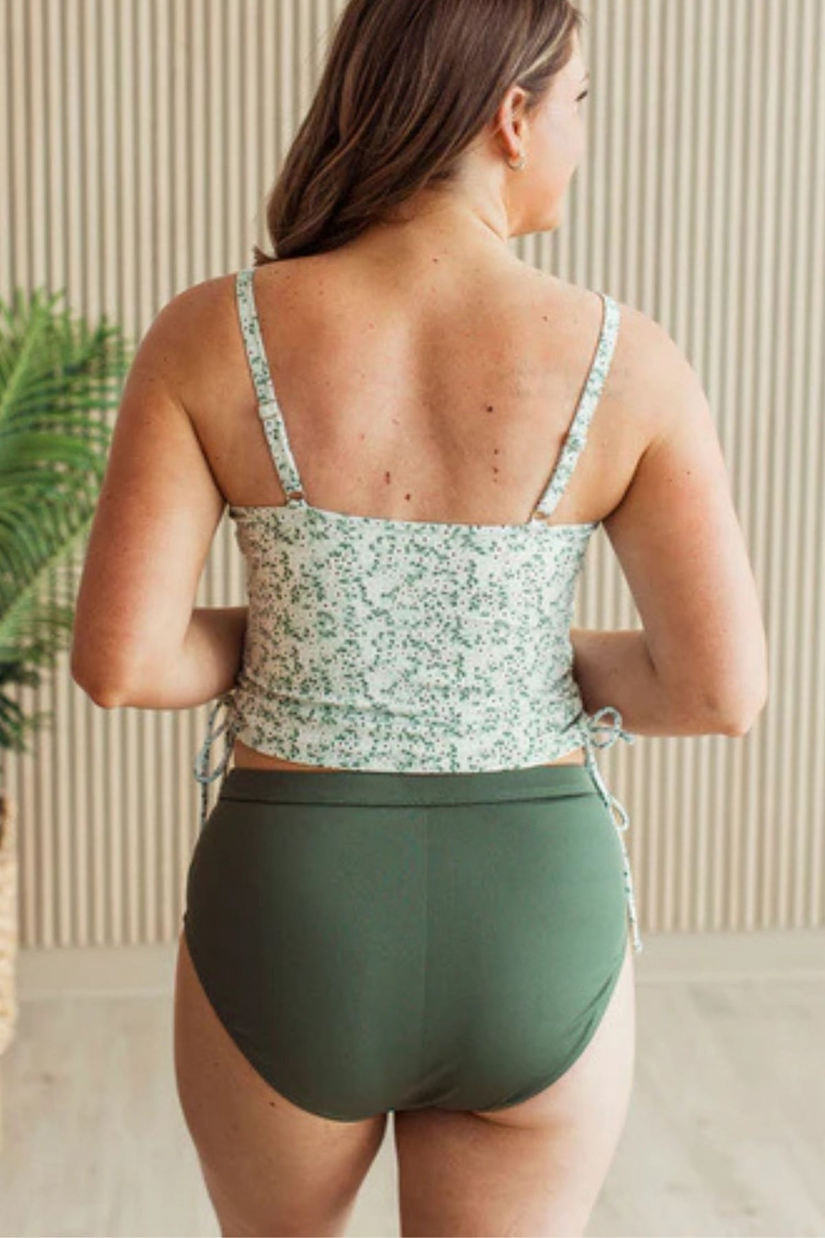 Green ribbed high rise bikini swim bottoms with flattering fit and coverage. showing back details