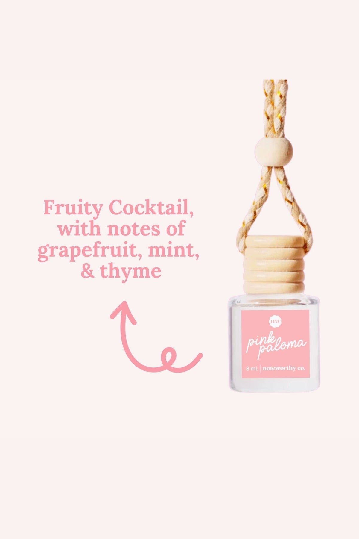 hanging car diffuser pink paloma scent bottle with wooden cap on a white background