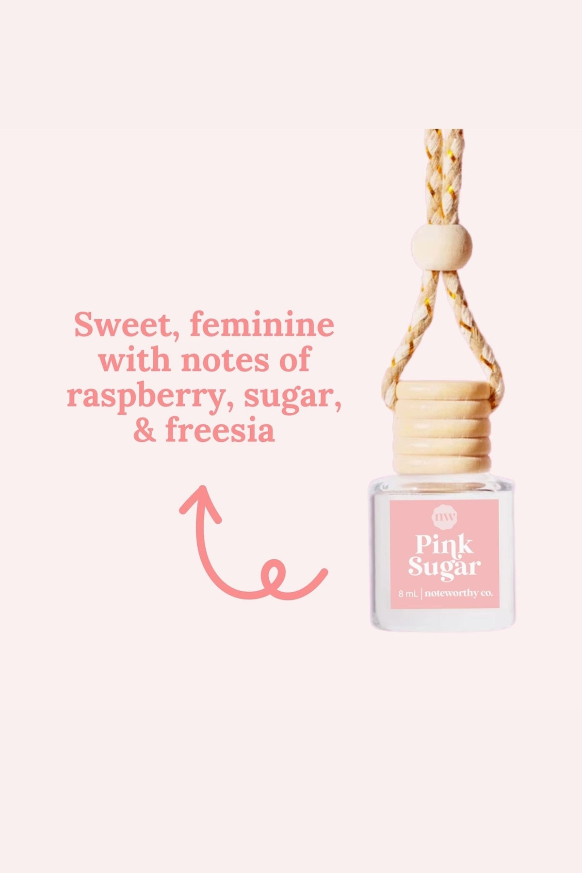 Pink Sugar car diffuser bottle with a beige strap on a white background