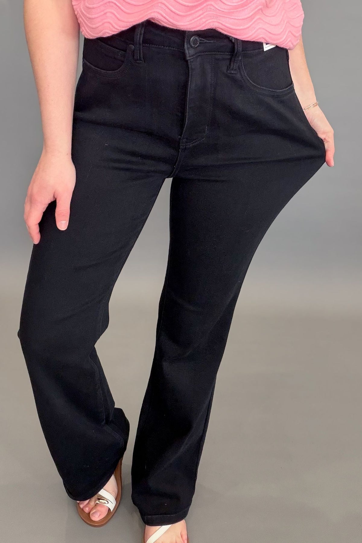 Judy Blue Brit high waist tummy control black bootcut jeans with stretchy comfortable fit showing stretch.