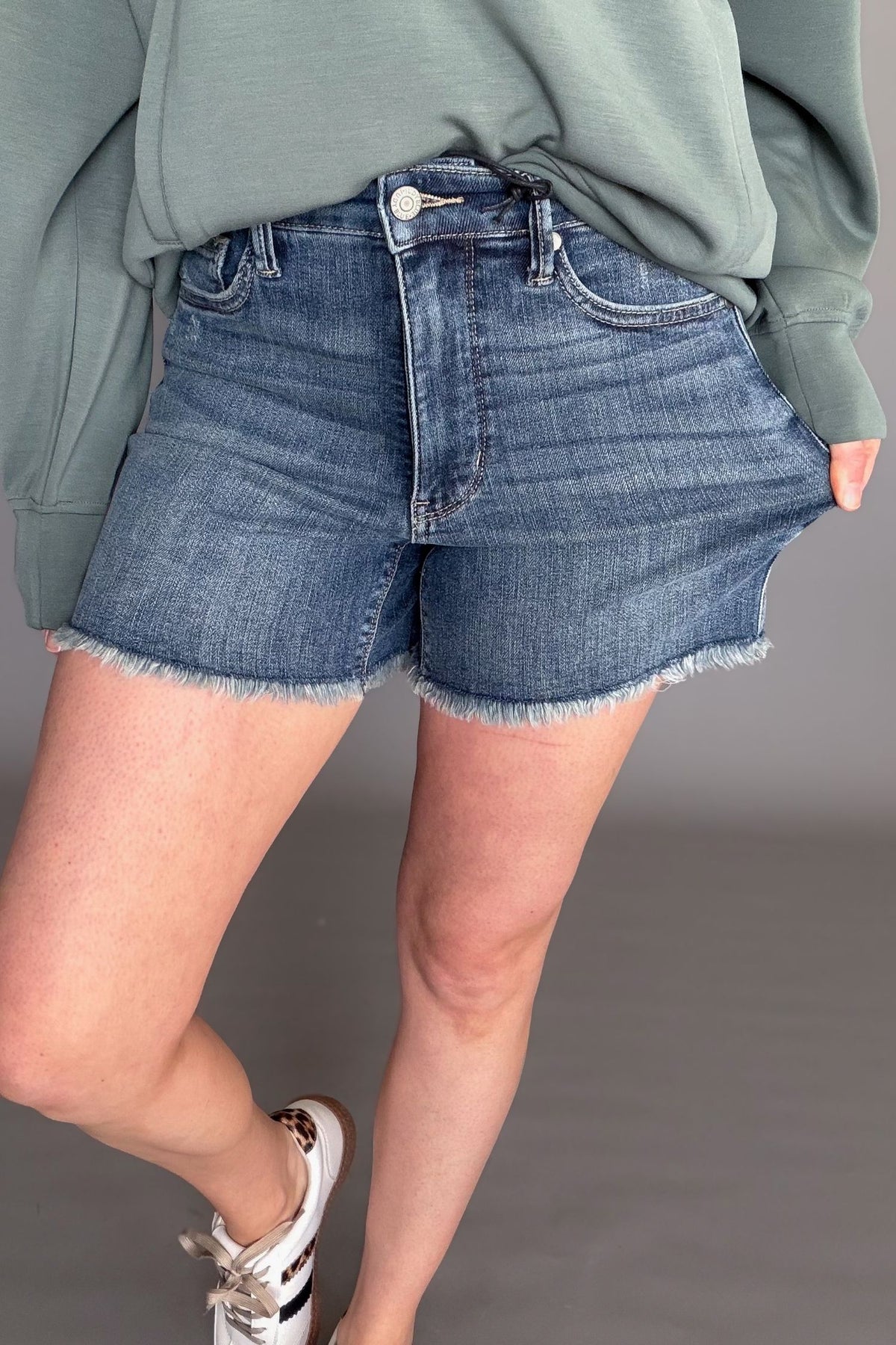 Judy Blue high rise tummy control fray hem denim shorts front view