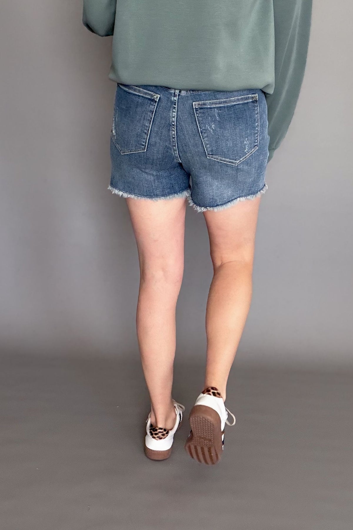 Boutique Judy Blue high waist tummy control jean shorts styled with sneakers showing back