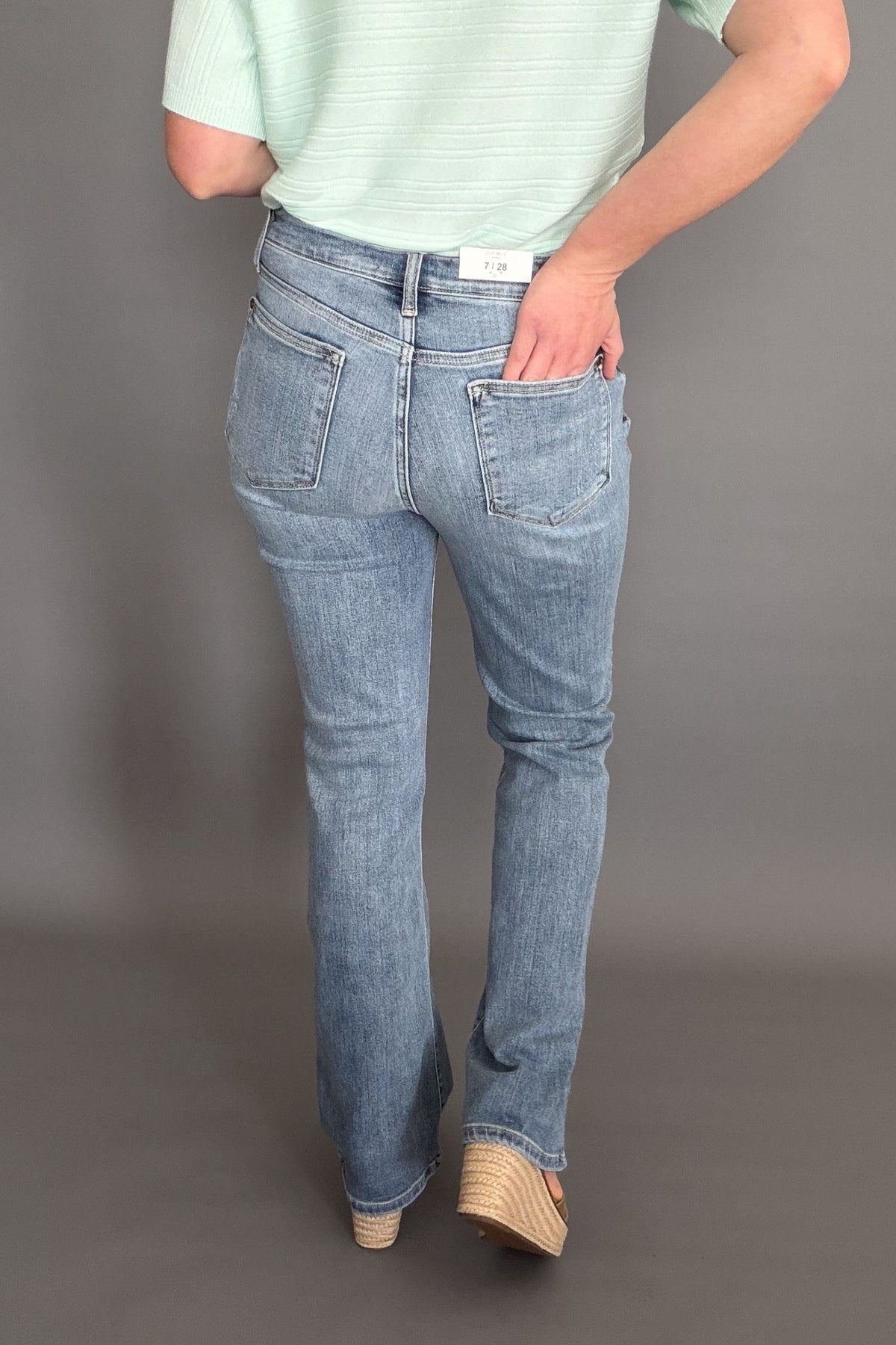 Judy Blue mid rise bootcut jeans with soft stretchy denim and flattering fit showing back details