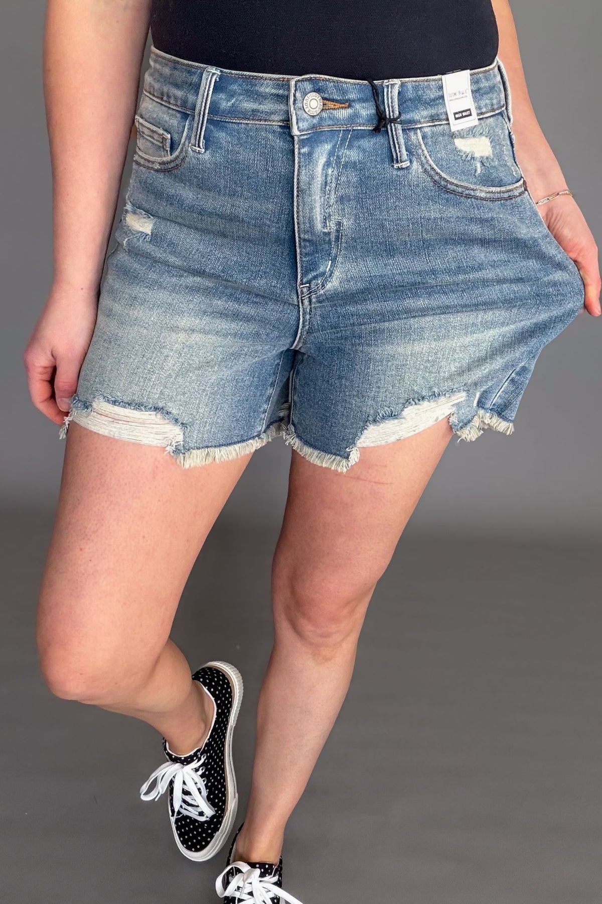 Front view Judy Blue Tinley high rise distressed denim shorts showing stretch