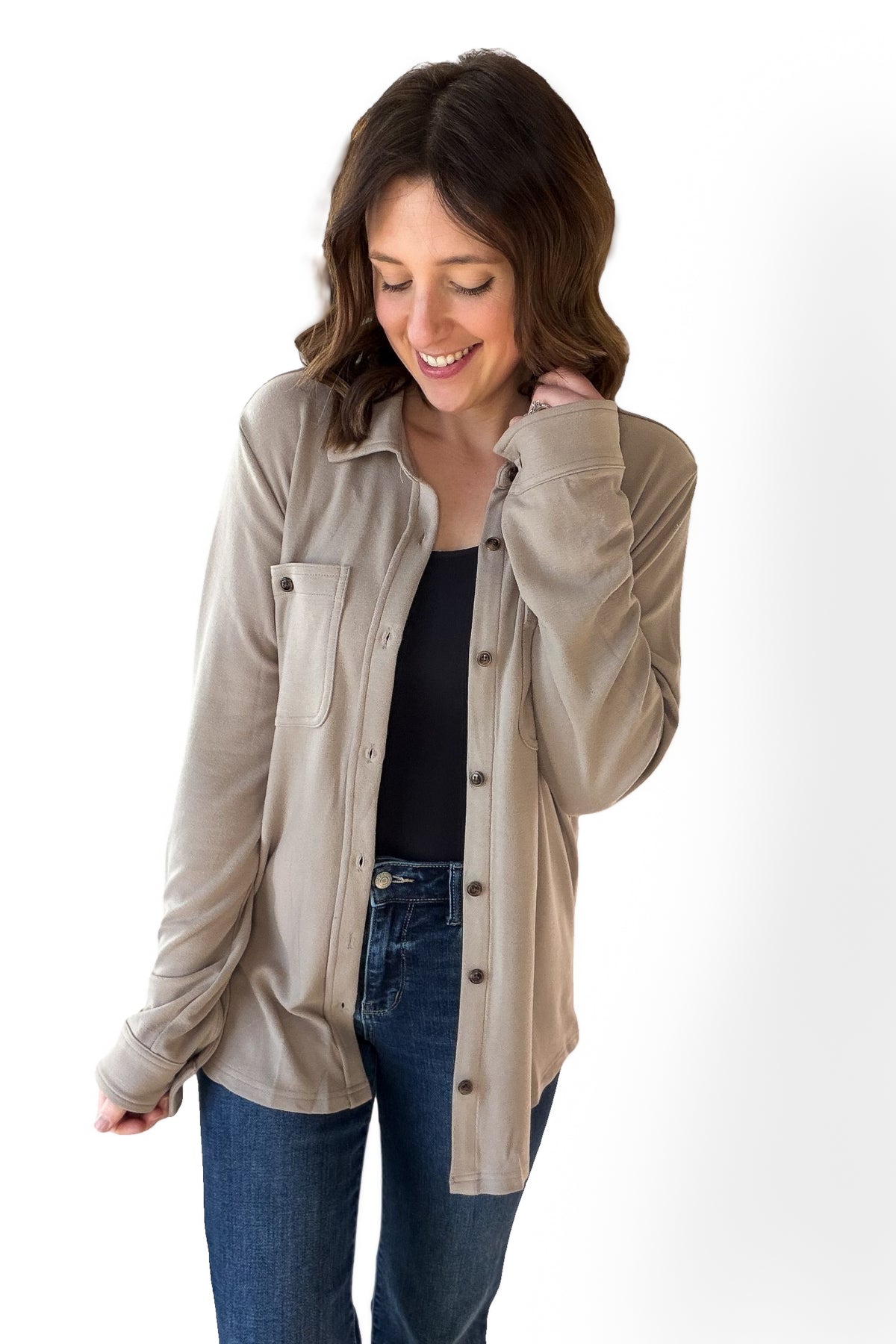 Woman wearing a mocha soft button up long sleeve
