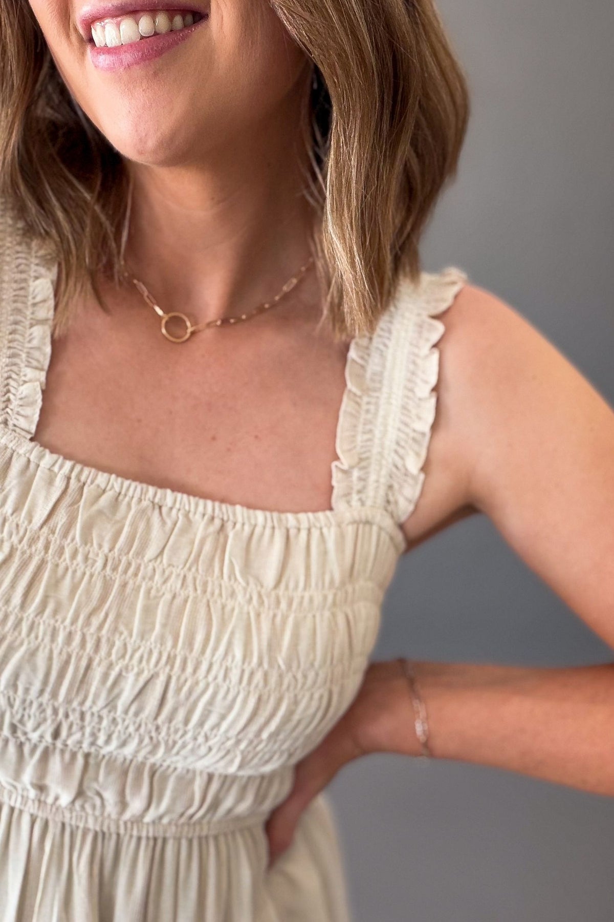 Ruffle strap smocked midi dress styled casually