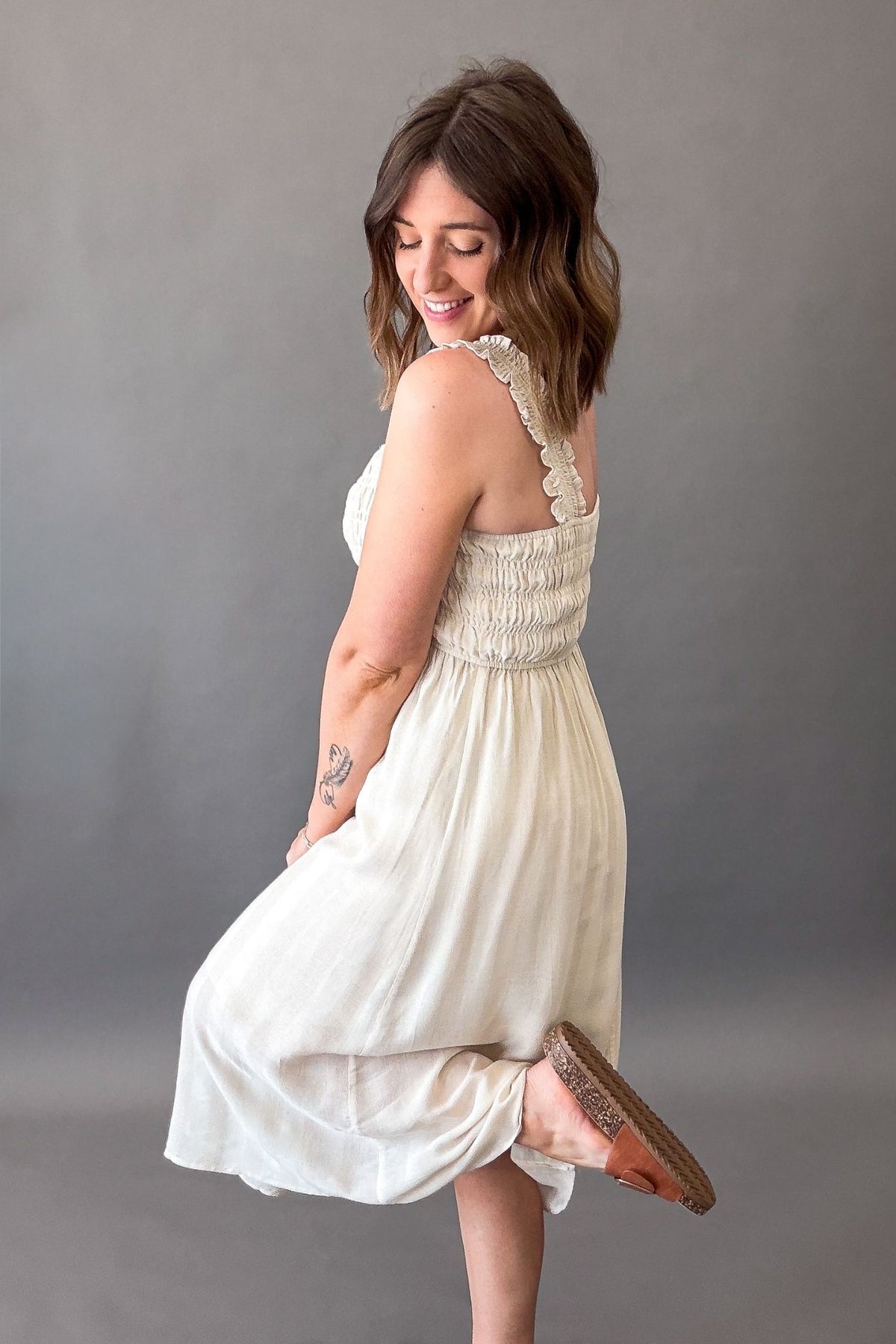 Feminine smocked bodice midi dress in natural color