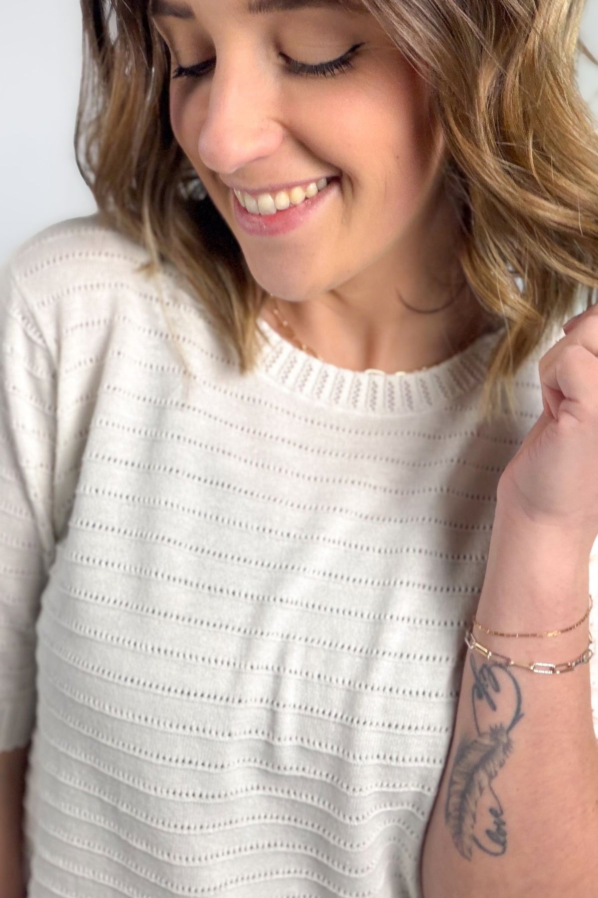 Off White Pointelle Texture Short Sleeve close up showing details