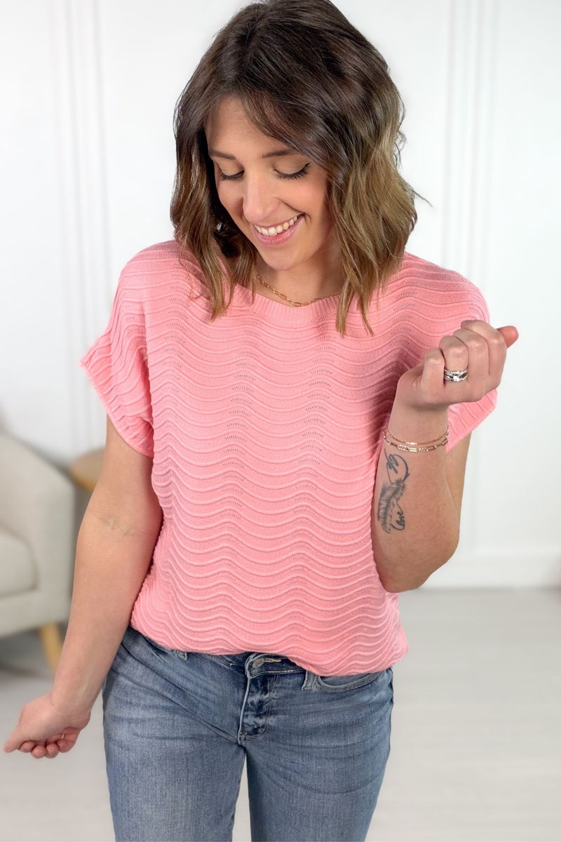 Pink scalloped textured short sleeve tee with soft lightweight knit and flattering fit.