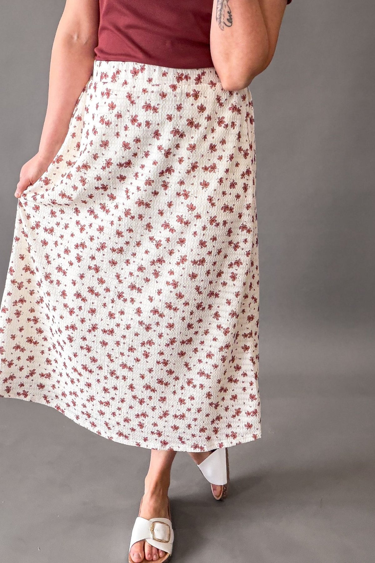woman wearing a textured modest floral skirt for everyday