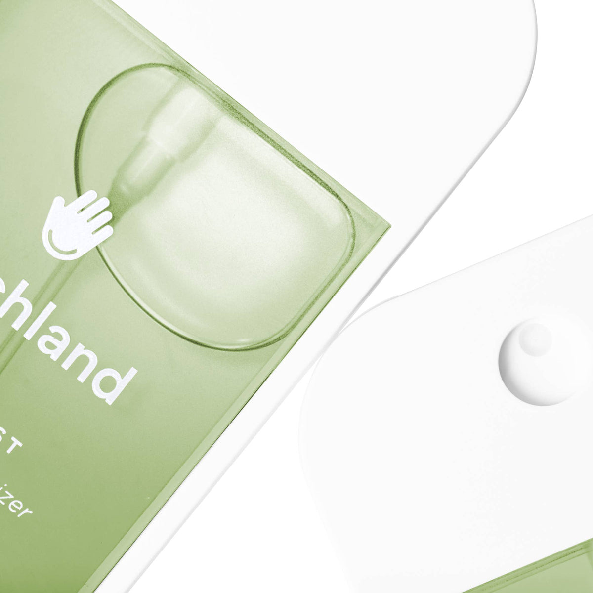 Green hand sanitizer bottle with pump on a white background