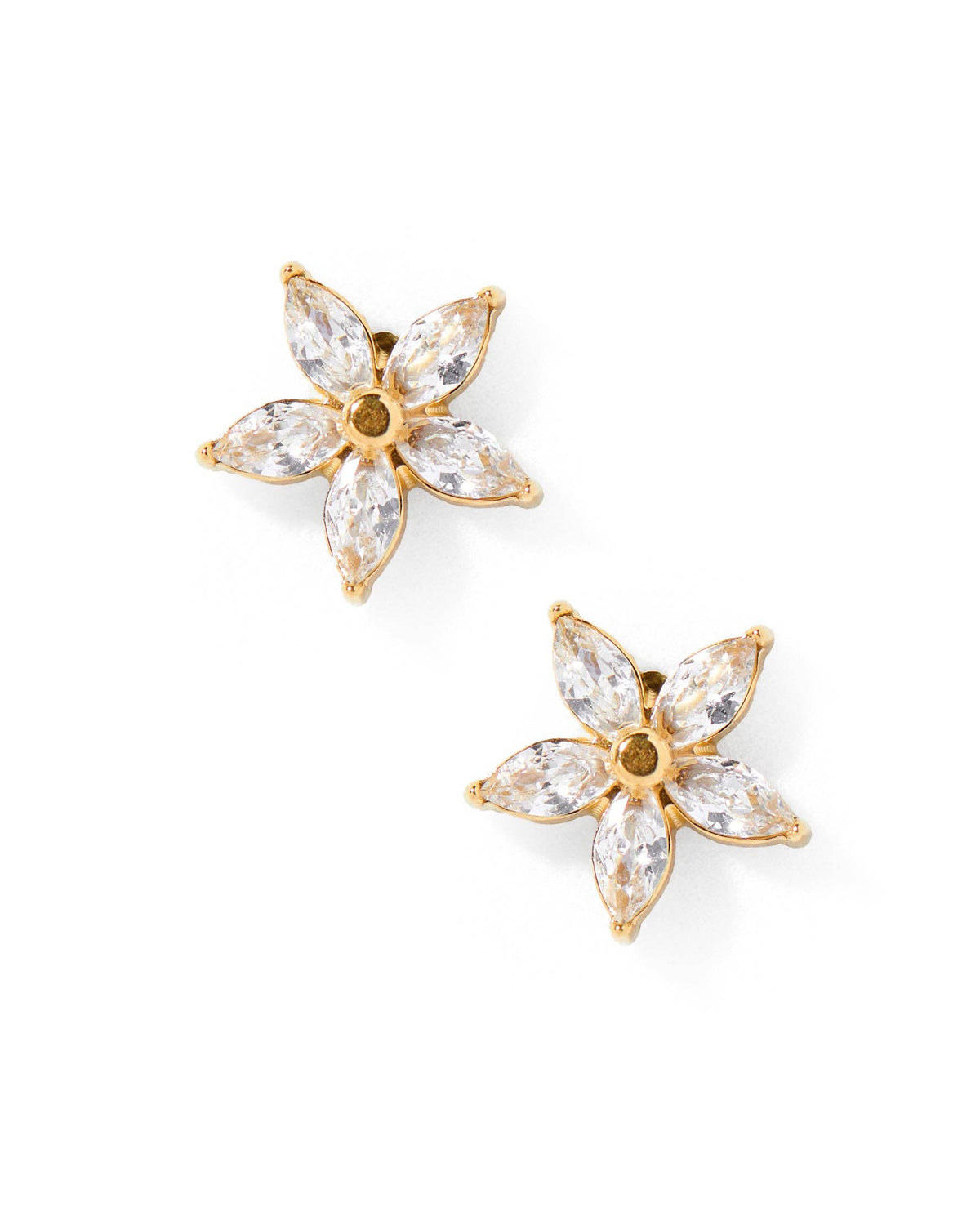 Gold flower-shaped earrings with clear gemstones on a white background
